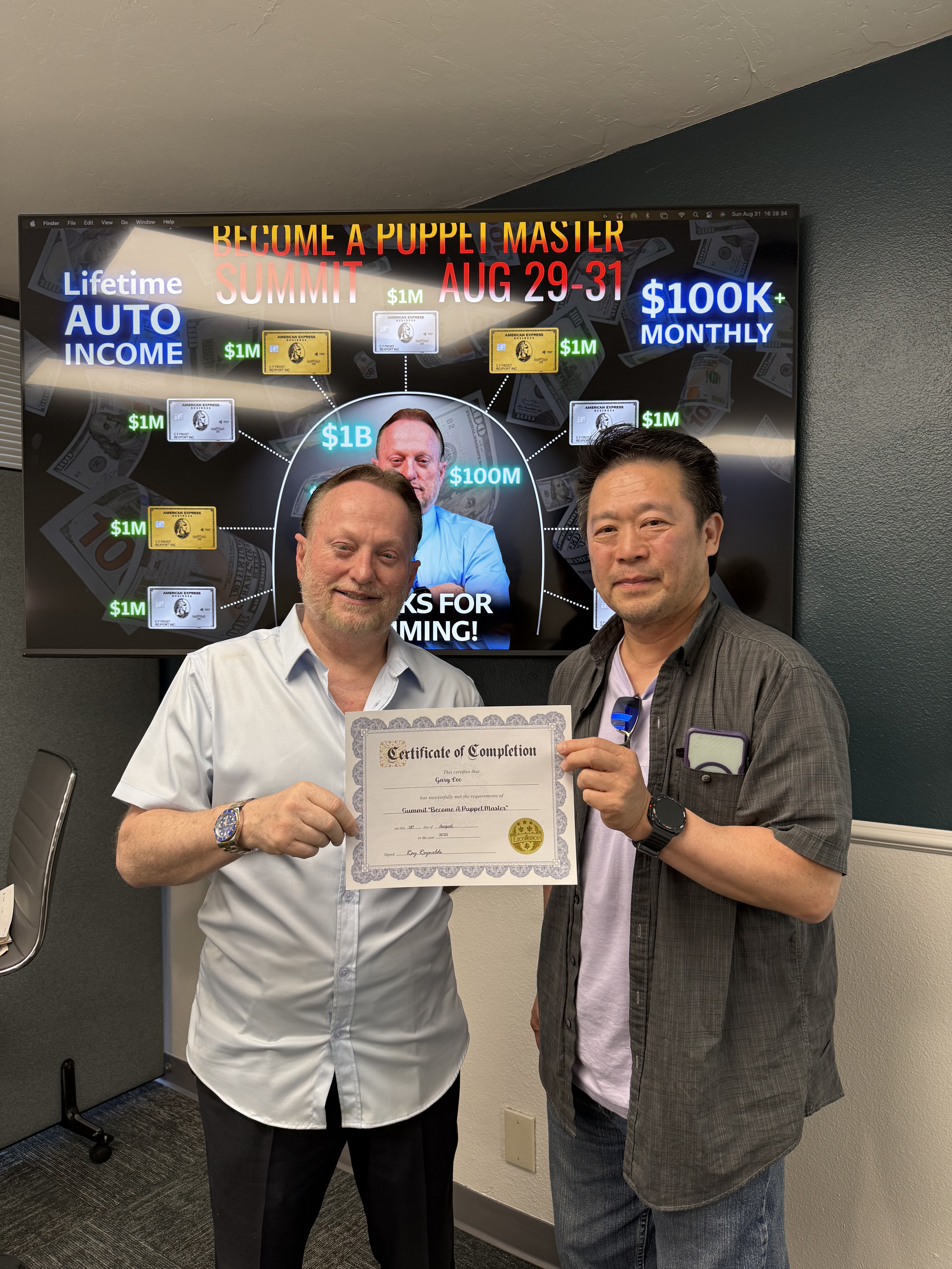 Ray Reynolds celebrating a client certificate